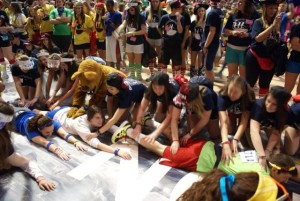 T2012 HON participants get massages from committee members and the Nittany Lion. Photo courtesy of Penn State Dance Marathon.